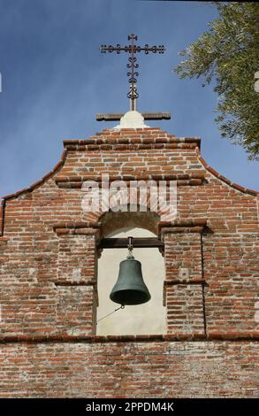 An old bell tower with a cross at the Mission San Antonio de Padua, Jolon CA. Stock Photo