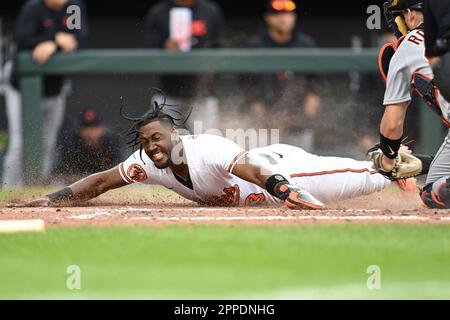 Baltimore Orioles' Jorge Mateo slides safely into home to score