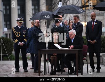 Ottawa, Canada. 23rd Apr, 2023. Federal President Frank-Walter Steinmeier and his wife Elke Büdenbender sign the guest book. The aim of the trip is to strengthen German-Canadian relations in difficult political and economic times. Credit: Britta Pedersen/dpa/Alamy Live News Stock Photo