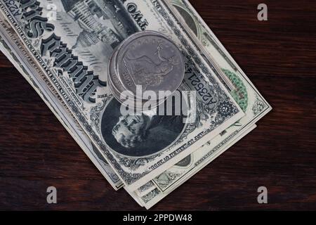 Old west period US banknotes and silver certificates with silver dollar coins Stock Photo