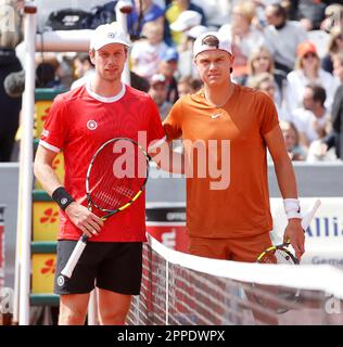 Munich, Germany. 23rd Apr, 2023. Holger Rune (R) of Denmark and Botic van de Zandschulp of the Netherlands pose for photos before the men's singles final match at the BMW Open 2023 in Munich, Germany, on April 23, 2023. Credit: Philippe Ruiz/Xinhua/Alamy Live News Stock Photo