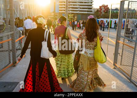 Barcelona, Spain. 23rd Apr, 2023. Women in traditional Andalusian dresses are seen during the celebrations for the 'Feria de Abril' fair in the Forum Park. The fair, known as Seville Fair, is originally from the Andalusian city of Seville, where people gather to drink and dance traditional flamenco music for seven days. Credit: SOPA Images Limited/Alamy Live News Stock Photo