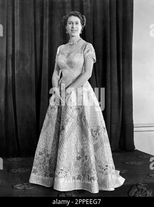 File photo dated 03/06/53 of Queen Elizabeth II, wearing a gown designed by Norman Hartnell for her Coronation. King Charles III's coronation will take place on May 6, in a ceremony steeped in 1,000 years of history. The King will be crowned with the historic St Edward's Crown - the same one his mother, Queen Elizabeth II, was crowned with. Issue date: Monday April 24, 2023. Stock Photo