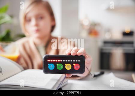 Child holding educational electronic game Stock Photo