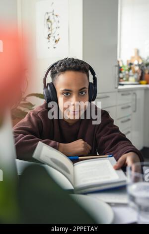 Boy doing homework at home Stock Photo