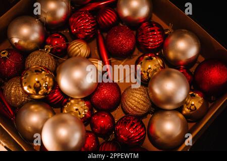 Close-up of various Christmas baubles in box Stock Photo