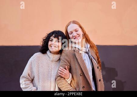 Portrait of smiling young women Stock Photo