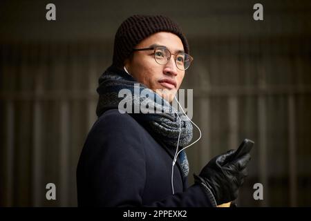 Smiling man looking away Stock Photo