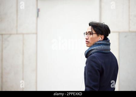 Mid adult man looking away Stock Photo
