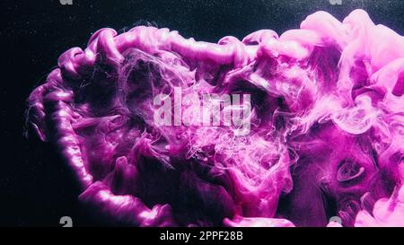Fluid splash color vapor ink water pink purple Stock Photo