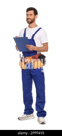 Professional plumber with clipboard and tool belt on white background Stock Photo