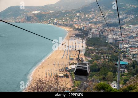 Top view of Cleopatra beach and Alanya from the cable car to Alanya castle Stock Photo