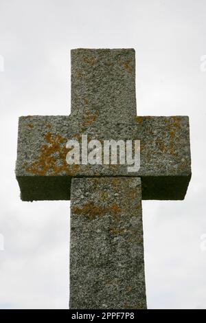 A large stone cross at the edge of the beach, Dragey-Ronthon, Normandy, France, Europe Stock Photo