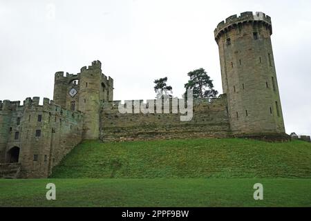 Exterior architecture and building design at Warwick castle, Medieval Fortress on the banks of the river Avon developed from a wooden fort- UK Stock Photo