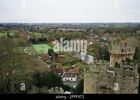 Exterior architecture and building design at Warwick castle, Medieval Fortress on the banks of the river Avon developed from a wooden fort- UK Stock Photo