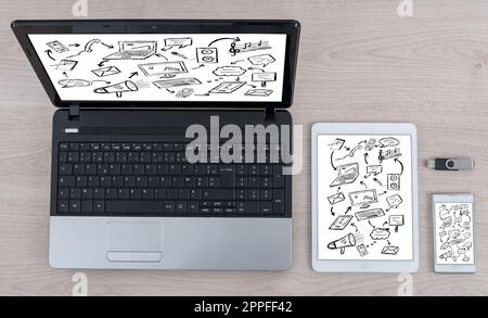 Communication concept shown on different information technology devices Stock Photo
