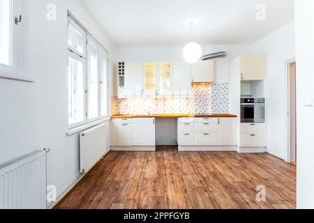 living room with kitchenette in a residential building Stock Photo