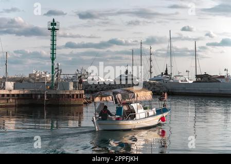 Traditional Cypriot Fishing boat sailing out of Limassol Old Port Stock Photo