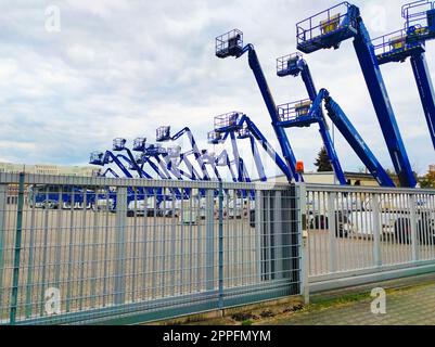 Bucket truck lift cranes in Neu-Isenburg, Germany Stock Photo
