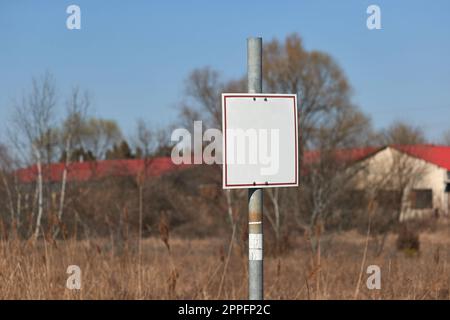 Empty sign on a land Stock Photo