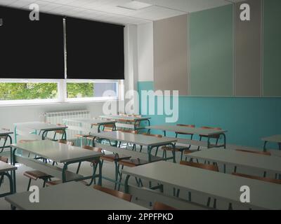 Lecture room with empty seats. Business seminar education. Modern new school. White furniture. Large windows with blackout curtains or blinds. Empty school classroom. Furniture and school equipment Stock Photo
