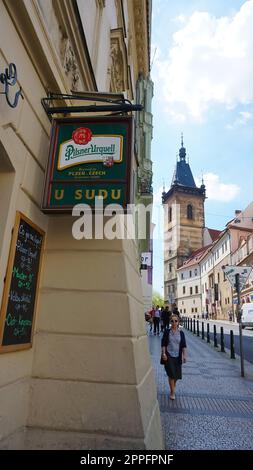 Logo of Pilsner Urquell. Sign with the green Pilsner Urquell logo at the facade - entrance to the beer restaurant in PRAGUE Pilsner is a Czech brand of light lager beer. Stock Photo