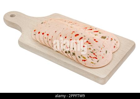 Cold poultry meat cut with paprica on wooden board isolated on white background Stock Photo