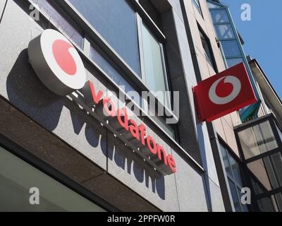 NUERNBERG - CIRCA JUNE 2022: Vodafone shopfront sign Stock Photo