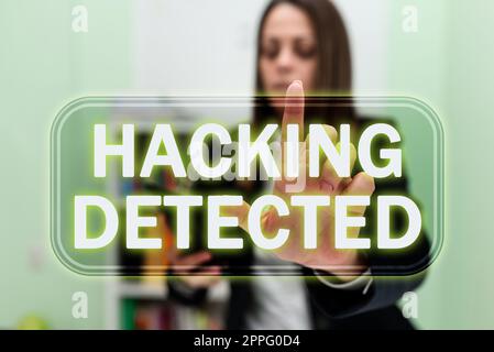 Writing displaying text Hacking Detected. Internet Concept activities that seek to compromise affairs are exposed Stock Photo