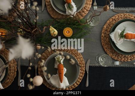 easter dinner table decorated ready for a family celebration Stock Photo