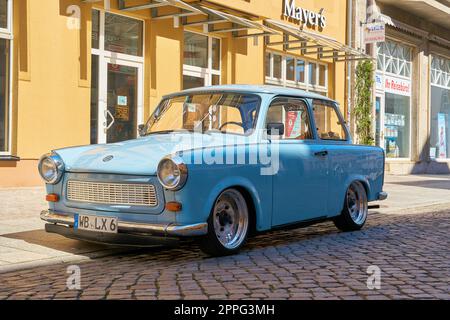 well preserved car Trabant from GDR production in the old town of Wittenberg in Germany Stock Photo