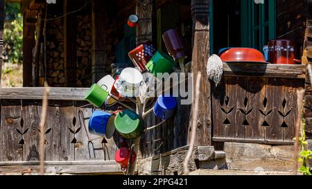 Pots and kitchen utensils at an old farm house in malamutes Stock Photo