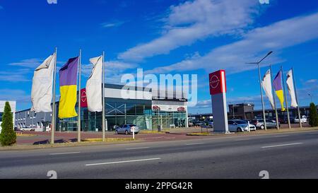 The car salon with Nissan logo at Kyiv, Ukraine Stock Photo