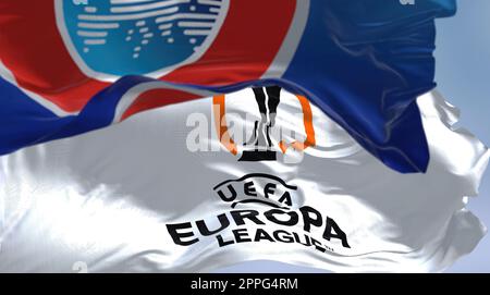 Flags with UEFA and UEFA Europa League waving in the wind Stock Photo