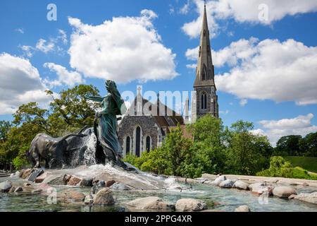 St. Alban Church and  Gefion Fountain located in port next to Kastellet, Copenhagen, Denmark Stock Photo