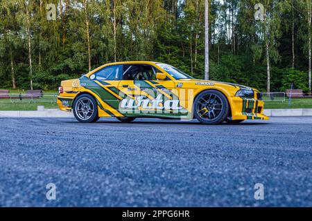 BMW drift race car on the asphalt at the drift show. Alytus, Lithuania, 1 July 2022 Stock Photo