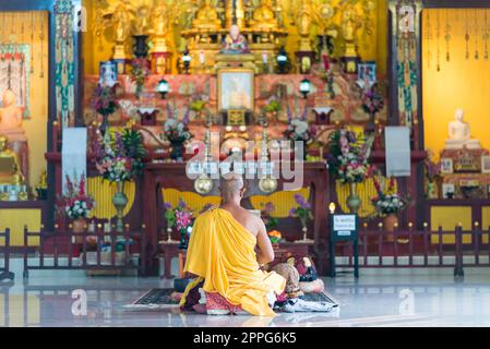 Buddhist monk in the temple of the Japanese Peace Pagoda in Unawatuna Stock Photo