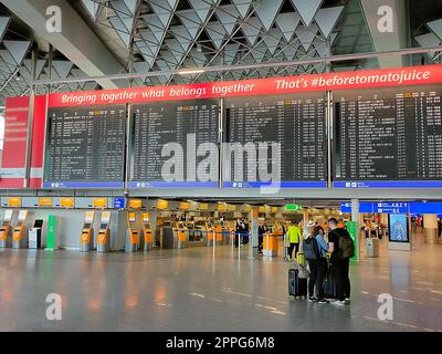 Airport wall with information board Frankfurt am Main, Germany Stock Photo