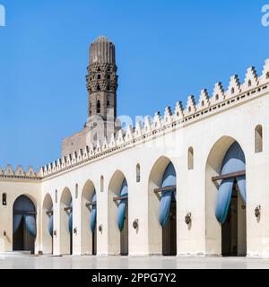 Minaret of historic Al Hakim Mosque known as The Enlightened Mosque, Moez Street, Old Cairo, Egypt Stock Photo