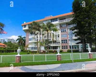 Modern apartment buildings with palm trees at Miami - view from road Stock Photo
