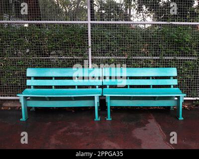 Lonely bench in a park in the bangkok Stock Photo