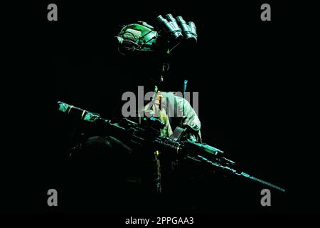 Army special forces shooter low key studio shoot Stock Photo