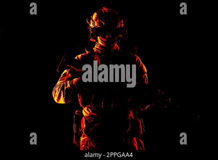 Army special forces fighter low key studio shoot Stock Photo