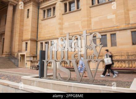 Sydney, Australia. 24th Apr, 2023. Visitors walk past the sign of the State Library of New South Wales in Sydney, Australia, on April 24, 2023. As the oldest library in Australia, the State Library of New South Wales (NSW) on Monday started opening Shakespeare Room seven days a week to the public for the first time in its history. Welcoming visitors in a social media post, the NSW State Library said that the Tudor-style room, opened in the early 1940s, was built to commemorate the 300th anniversary of Shakespeare's death. Credit: Xinhua/Alamy Live News Stock Photo