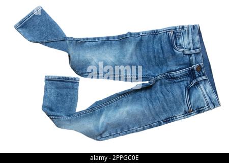 Blue jeans. Closeup of a trendy stylish blue denim pants or trousers for boys isolated on a white background. Kids summer and autumn fashion. Front view. Stock Photo