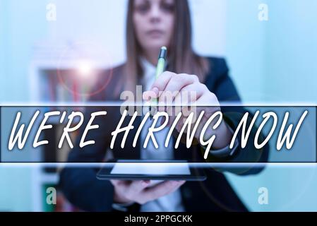 Text caption presenting We'Re Hiring Now. Concept meaning recently employ someone or pay someone to do particular job Stock Photo