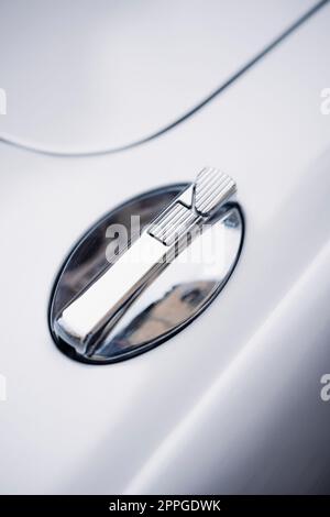 Vintage car fuel tank cap with key slot Stock Photo