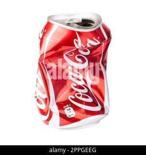 Crushed Coca Cola can isolated Stock Photo