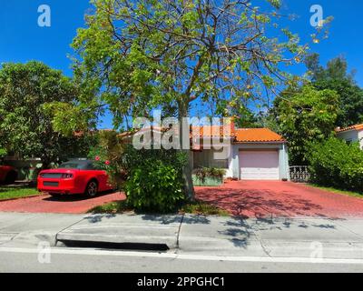 Modern apartment building with palm trees at Miami - view from road Stock Photo