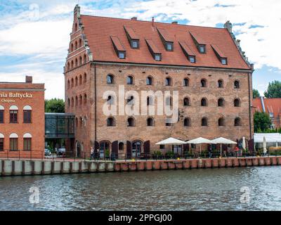 A restored medieval granary on the Olowianka island in the old town of Gdansk Stock Photo
